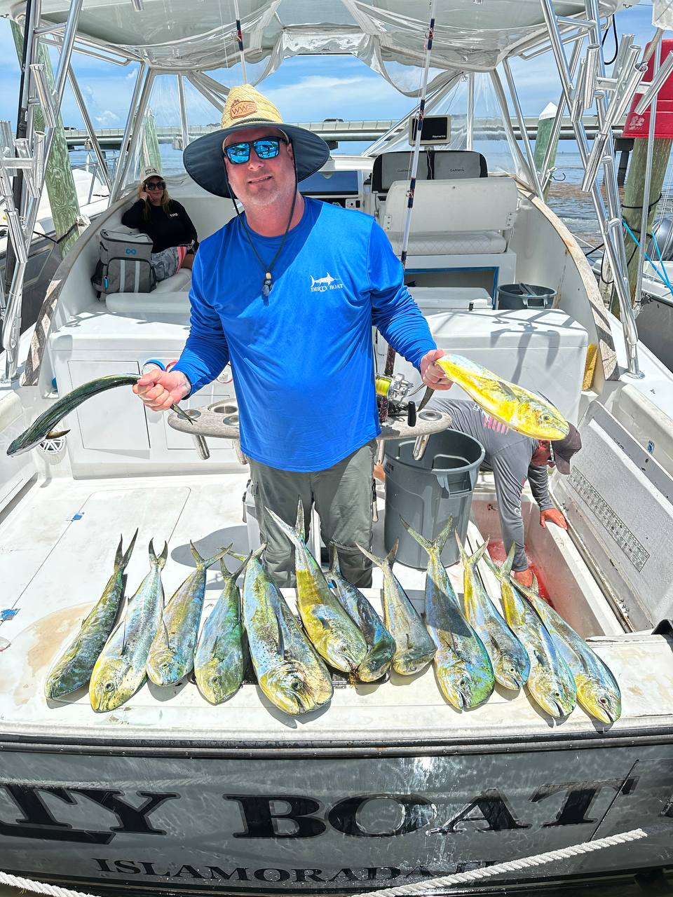 Schoolie mahi spread on the Dirty Boat transom
