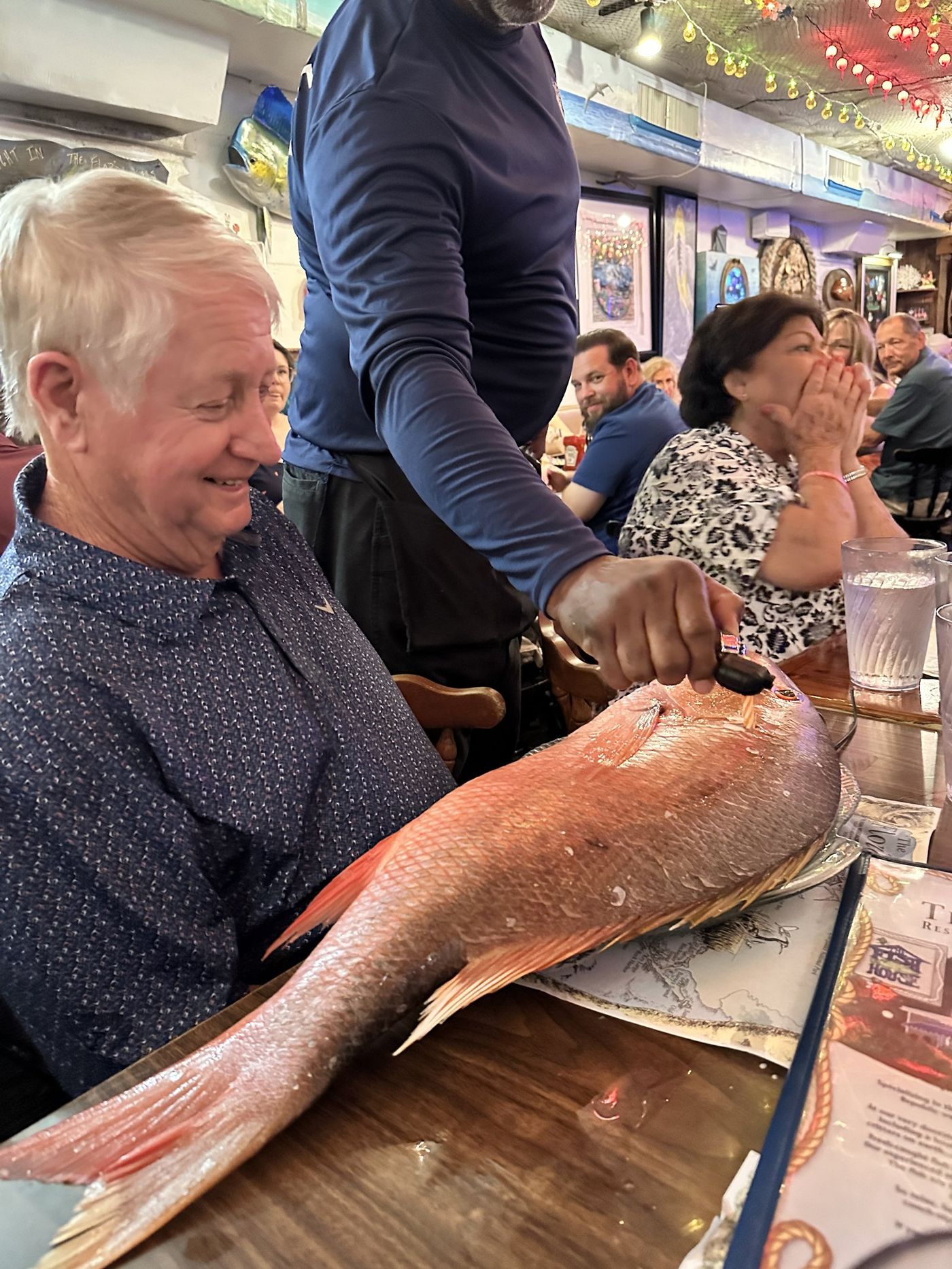Dad Chris and the mutton, cooked at the Fish House in Key Largo