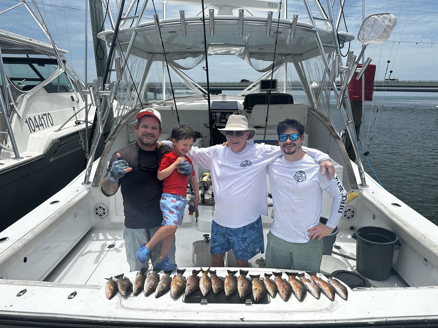 Matt, Matthias, Dad Chris, and me at the dock with the reef spread